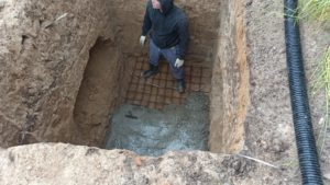 Заливание плиты для якорения септика